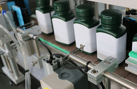 藥瓶多面貼標(biāo)機