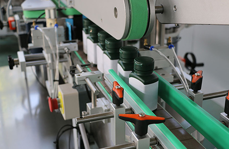 藥瓶多面貼標(biāo)機